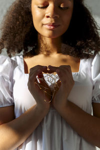 Portrait of young woman with tattoo