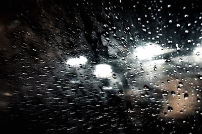 Close-up of water drops on glass