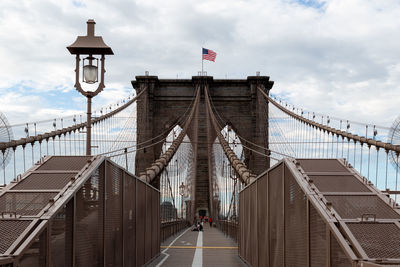 View of bridge against cloudy sky