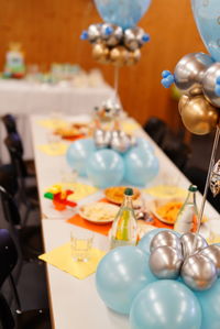 Close-up of multi colored balloons on table