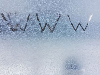 Close-up of text on snow