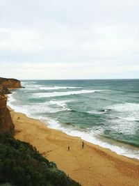 View of calm beach against the sky