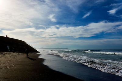Scenic view of beach against sky