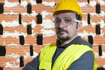 Portrait of confident architect at construction site