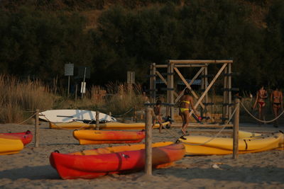 Boats moored on shore