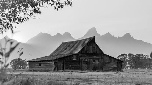 House on field against sky