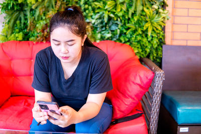 Young man using mobile phone