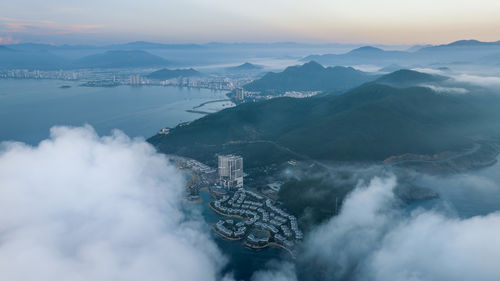 Aerial view of cityscape against sky during sunset