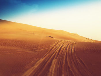 Scenic view of desert against sky