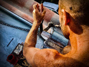 High angle view of man using mobile phone