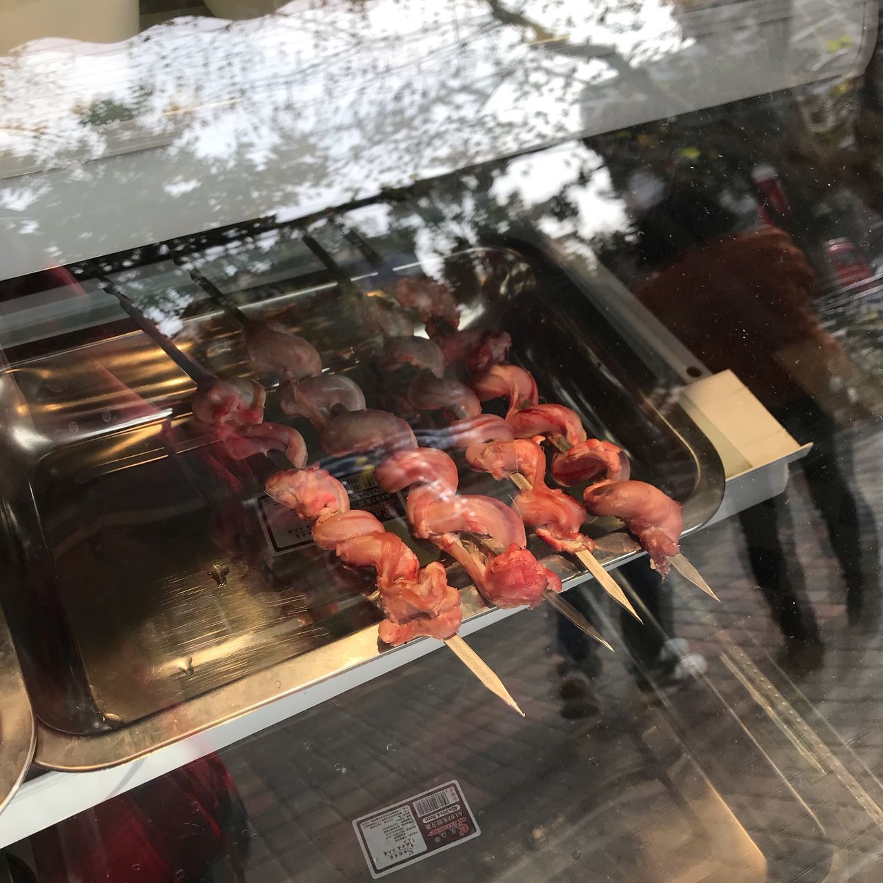 HIGH ANGLE VIEW OF MEAT IN BARBECUE GRILL