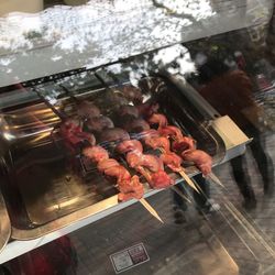 High angle view of meat on barbecue grill