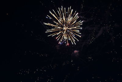 Firework display at night