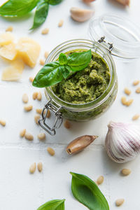 Fresh made pesto sauce. green basil pesto. ingredient for pesto sauce 