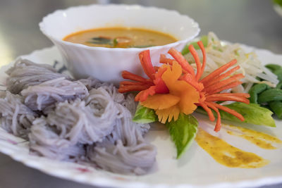 Close-up of chopped vegetables in bowl on table