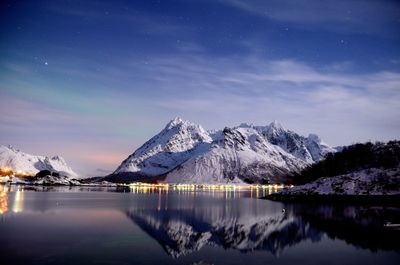 Scenic view of snowcapped mountains against sky during winter