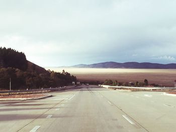 Country road passing through landscape