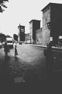 Woman walking on city street