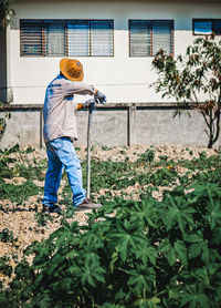 Man working on plants