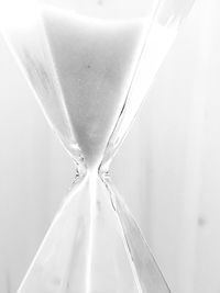 Close-up of clock on glass