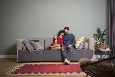 Couple sitting together on the couch