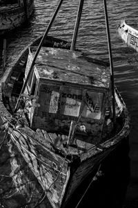 High angle view of damaged boat moored in sea