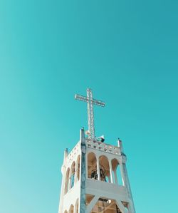 Low angle view of traditional building against clear blue sky