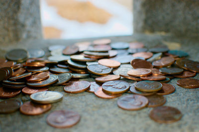 Close-up of coins on table