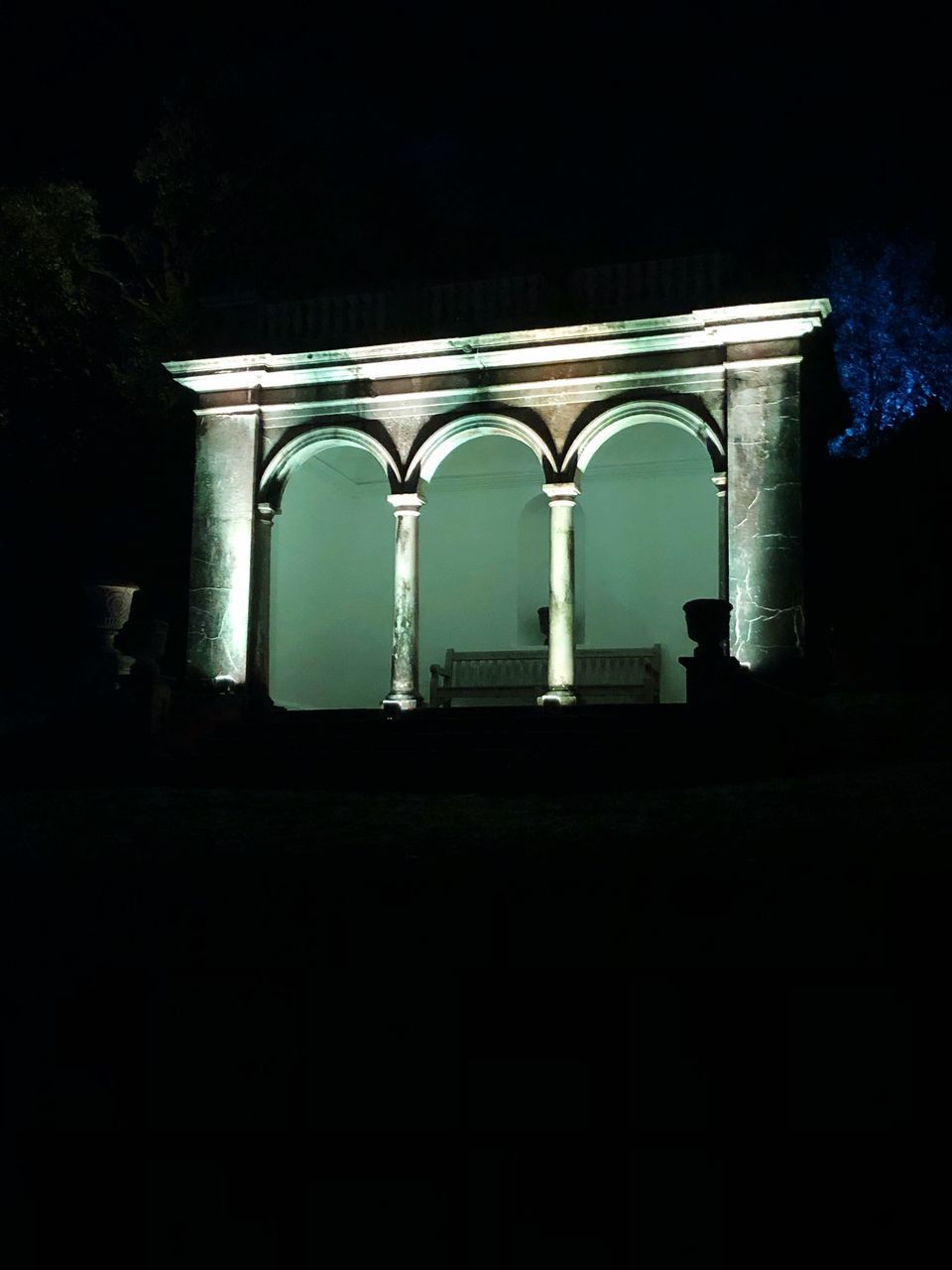 LOW ANGLE VIEW OF ILLUMINATED BUILDING