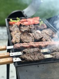 Cropped hand of man preparing food