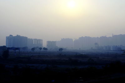 View of cityscape at sunset