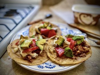 High angle view of mexican meal in plate on table