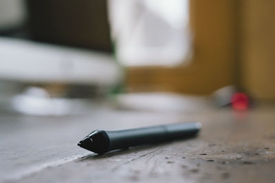 Close-up of cigarette on table