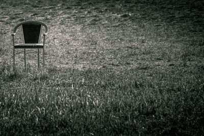 Empty chair on field