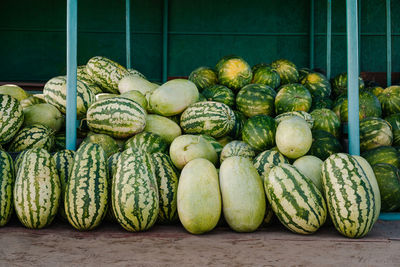 Watermelon fruits for sale at market stall