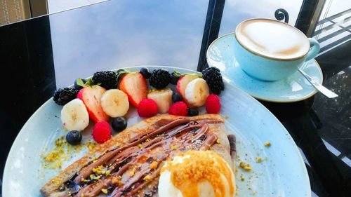 High angle view of breakfast served on table