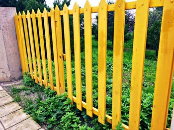 High angle view of fence on grass