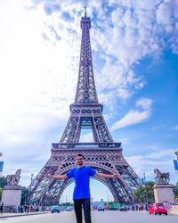 Low angle view of tower against sky in city