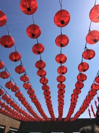 Low angle view of lanterns hanging in row