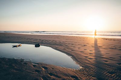 Scenic view of sea at sunset