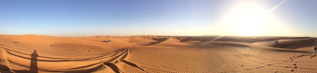 Scenic view of desert against clear sky