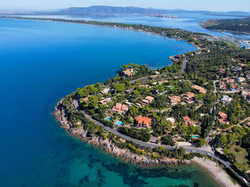 Aerial view of the argentario coast, in the background the orbetello lagoon.