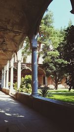 View of historic building with bridge in background