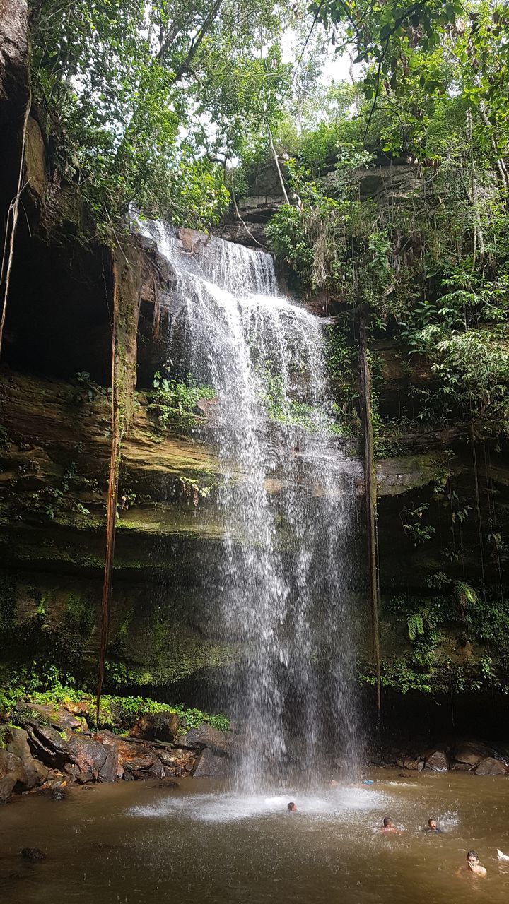 WATER FLOWING THROUGH ROCKS