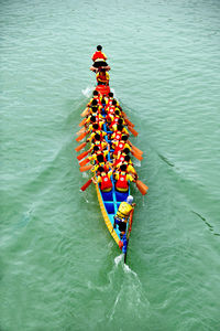 High angle view of people in boat on river