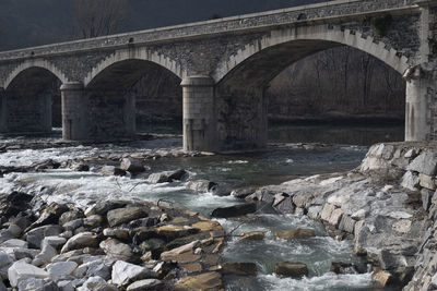 Arch bridge over river