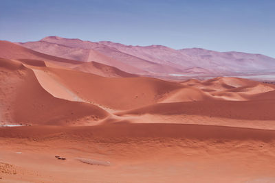 Scenic view of desert against clear sky