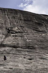 Rock formations on land against sky