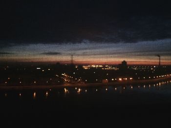 River in city at night