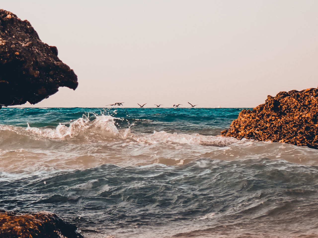 PANORAMIC VIEW OF BEACH AGAINST CLEAR SKY